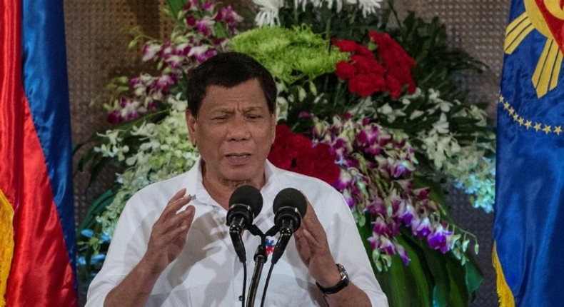 Rodrigo Duterte ends his first year as Philippine president hugely popular, taking Filipinos on a promised rough ride of drug war killings and foreign policy U-turns