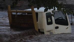 A lorry stuck inside Muswii River in Makueni County