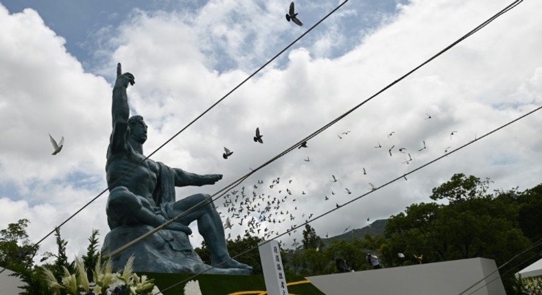 Doves fly during a ceremony marking the 75th anniversary of the atomic bombing of Nagasaki, at the city's Peace Park