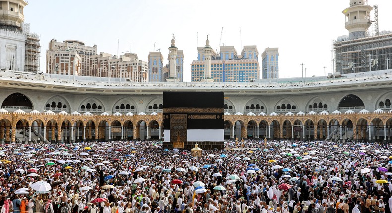 Muslim pilgrims perform the farewell circumambulation or tawaf, circling seven times around the Kaaba, Islam's holiest shrine, at the Grand Mosque in the holy city of Mecca on June 18, 2024. [Getty Images]