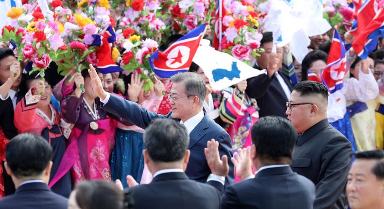 South Korean President Moon Jae-in and North Korean leader Kim Jong Un at an official welcome ceremony at Pyongyang Sunan International Airport in Pyongyang, North Korea.