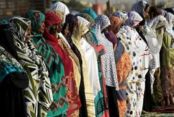 Muslim women gather during Eid al-Adha prayers in Khartoum