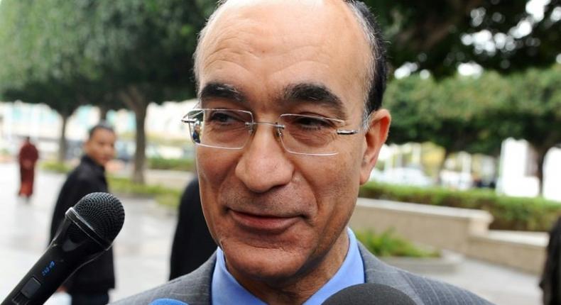 Tunisian then-Defence Minister Ridha Grira speaks to the press upon arrival to attend the first ministers session, on January 20, 2011 in the government palace in Tunis