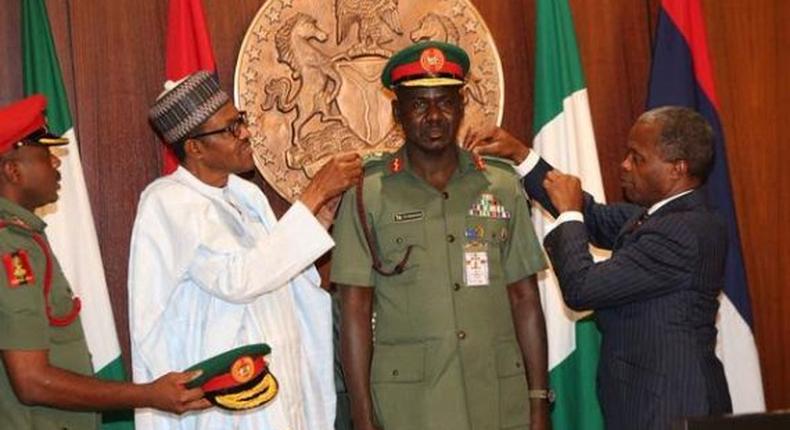 President Muhammadu Buhari decorates new service chiefs on August 13, 2015.