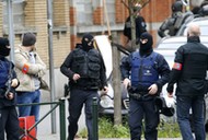 Belgian police stage raid in Brussels suburb of Molenbeek