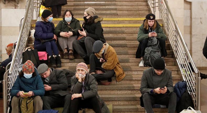 People take shelter in a subway station in Kyiv, Ukraine, on February 24, 2022.