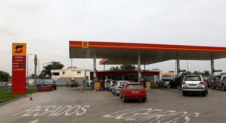 Motorists queue for petrol in the Angolan capital of Luanda, in a file photo. REUTERS/Siphiwe Sibeko