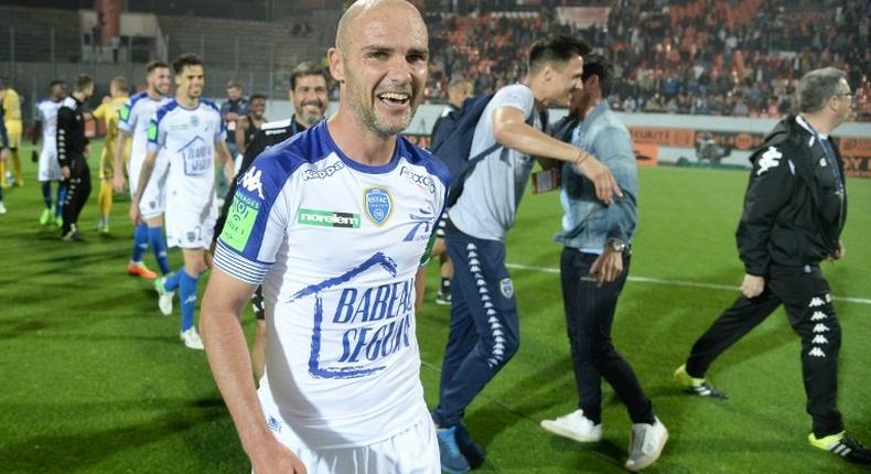 Troyes' midfielder Benjamin Nivet celebrates at the end of the play-off match against Lorient on May 28, 2017