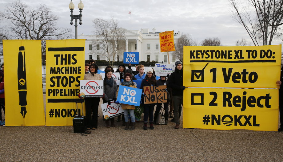 Veto supporters rally in front of the White House on the same day U.S. President Barack Obama vetoed a Republican bill approving the Keystone XL oil pipeline from Canada, in Washington, February 24, 2015.