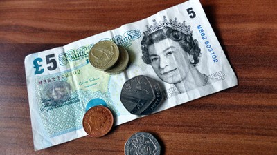 British pound surges to 12-month high to defy expectations