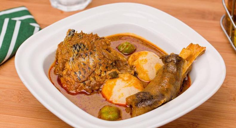 Banku and palm nut soup