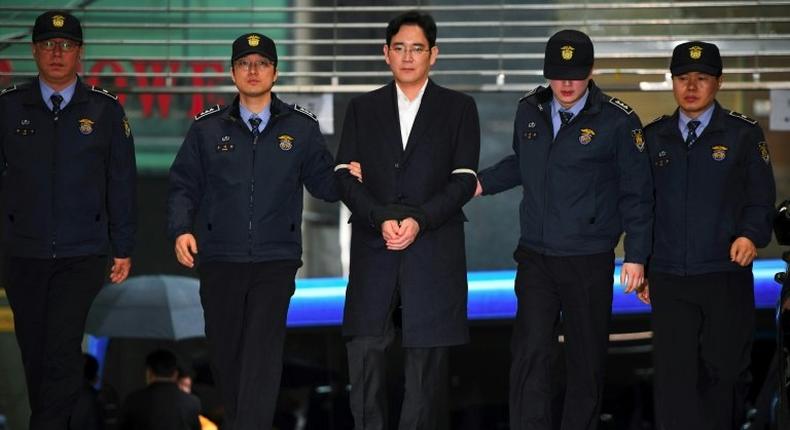 The indictment of Lee Jae-Yong (C), vice chairman of Samsung Electronics, casts new uncertainty over South Korea's biggest firm