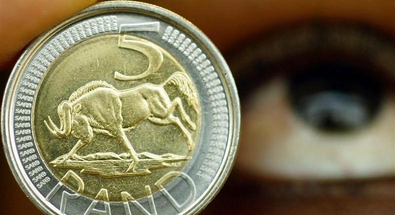 A five rand coin is displayed at the South African Mint in a file photo. 