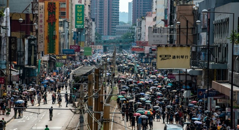 Protesters spilled into the streets of Yuen Long on Sunday afternoon