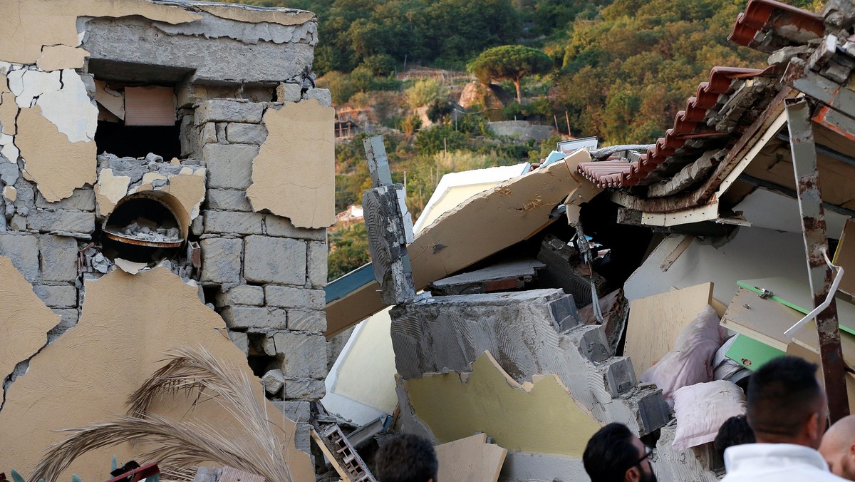 Collapsed houses are seen after an earthquake hits the island of Ischia, off the coast of Naples