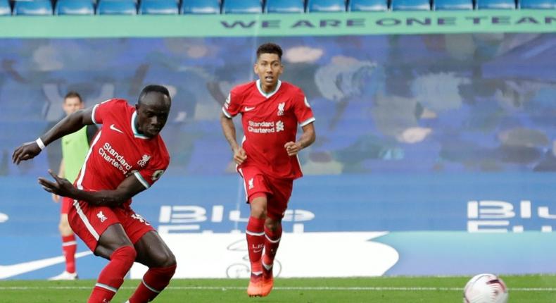 Senegalese Sadio Mane (L) scores his second goal for Liverpool in a 2-0 English Premier League win at Chelsea.