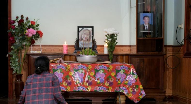 A portrait of Bui Thi Nhung (C) is kept on a prayer altar at her house in Vietnam. Nhung's family fear she could be among the 39 people found dead in a truck near London