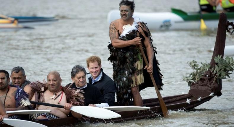 Britain's Prince Harry (2nd R) took a canoe ride along the Whanganui river, the third longest in New Zealand, on a trip to the country in May 2015