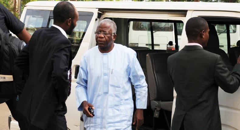 Former Head of Service of the Federation, Steve Oronsaye (middle) on arrival at the Federal High Court, Abuja to a 24-count charge of corruption. He has been charged for another two-count charge of corruption and obtaining through false pretense. PHOTO: Ladidi Lucy elukpo