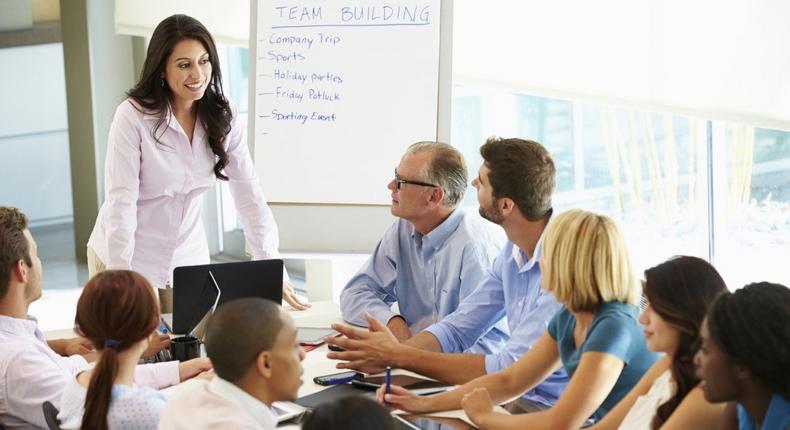 Staffs of an organisation holding a business meeting