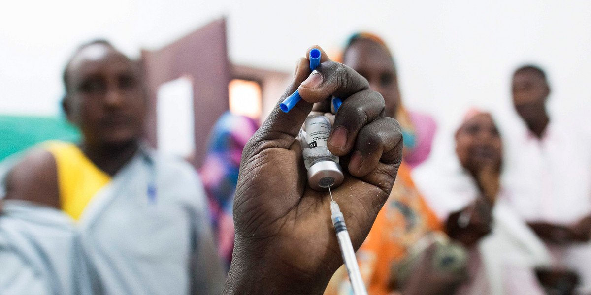 Staff members of Teaching Hospital receive the first vaccination treatment for yellow fever in El Geneina, West Darfur.