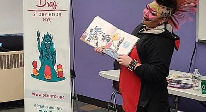 Drag king Oliver H reads to children at a Drag Story Hour in Queens, NY on December 12, 2022.Oliver H/Insider