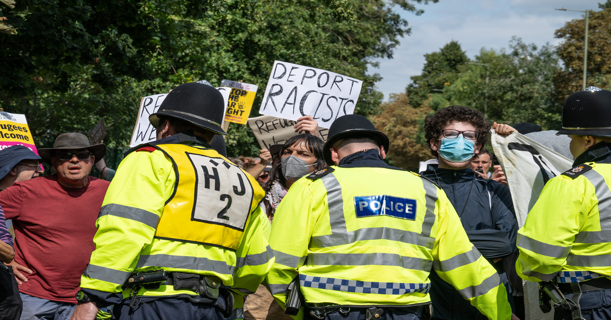 Police clash with protesters as asylum demos erupt across UK