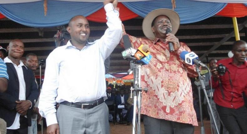 Suna East MP Junet Mohammed with ODM leader Raila Odinga at a past rally at Migori Stadium. Jubilee MPs claim the two were among beneficiaries of the NYS scandal.