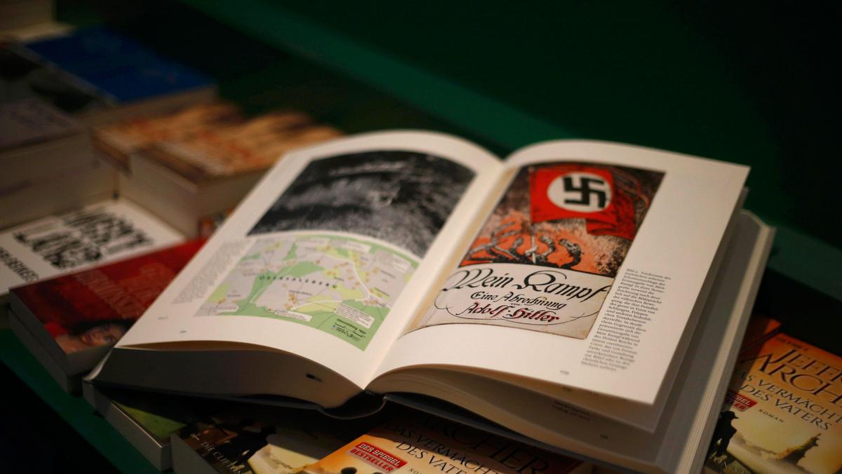 A copy of the book 'Hitler, Mein Kampf. A Critical Edition' lies on a display table in a bookshop in