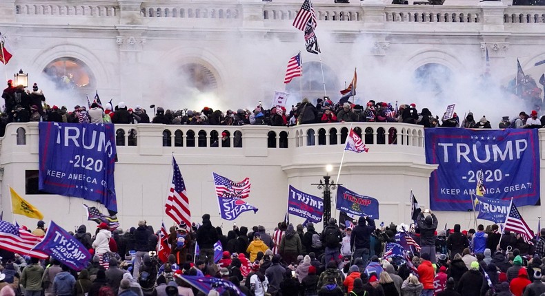 Rioters supporting President Donald Trump storm the Capitol in Washington on January 6, 2021.