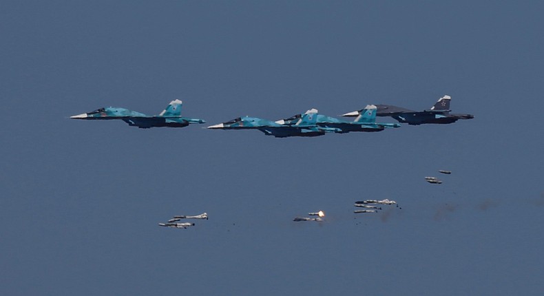 Sukhoi Su-34 bombers drop bombs during the Keys to the Sky competition at the International Army Games 2017 at the Ashuluk shooting range outside Astrakhan.MAXIM SHEMETOV/Reuters