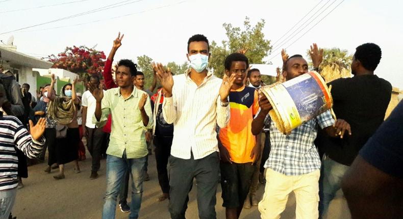 Sudanese protesters chant slogans during a demonstration against President Omar al-Bashir in the capital Khartoum's twin city of Omdurman on January 29, 2019