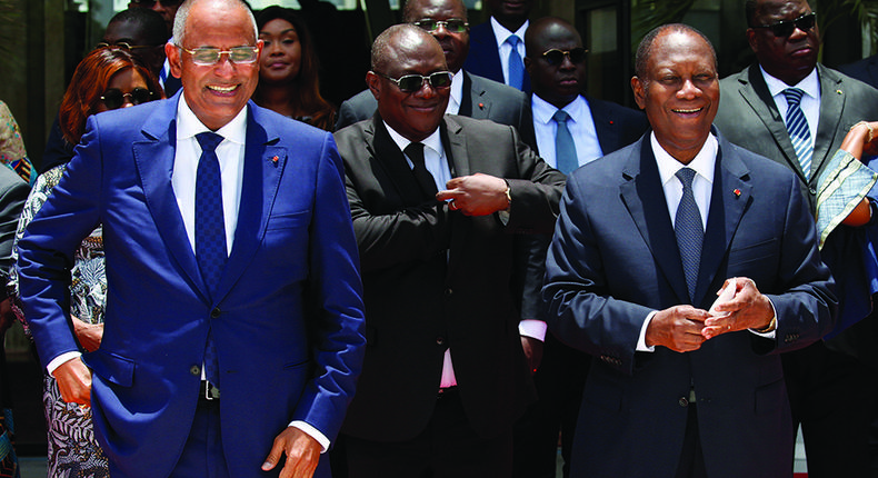 President Alassane Ouattara with Prime Minister Patrick Achi. (Image Source: The Africa Report)