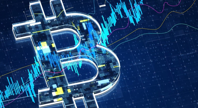 Bitcoin sign stock market data.Getty Images