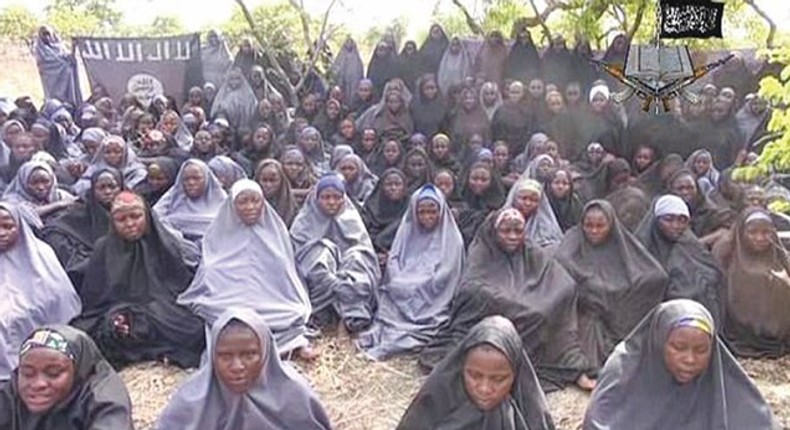 A screen shot of a video showing a number of abducted Chibok schoolgirls