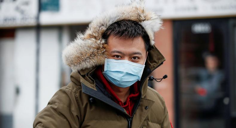 A man wears a masks in Chinatown following the outbreak of a new coronavirus, in Chicago, Illinois, U.S. January 30, 2020. REUTERS/Kamil Krzaczynski