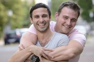 Happy gay couple outdoors