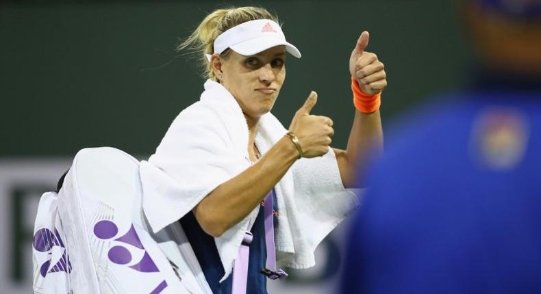 Angelique Kerber of Germany walks off the court after her straight set defeat by Elena Vesnina of Russia in their BNP Paribas Open fourth round match, at Indian Wells Tennis Garden in California, on March 14, 2017