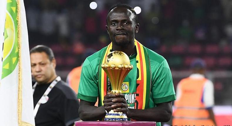 Sadio Mane with the AFCON trophy