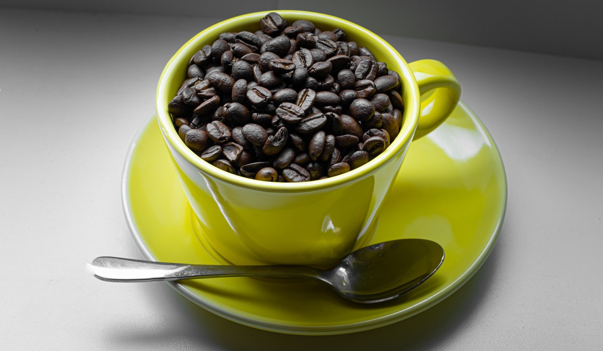 Caffe,Beans,In,Yellow,Cup