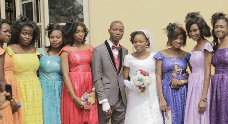 Bridesmaids and their multi colored dresses