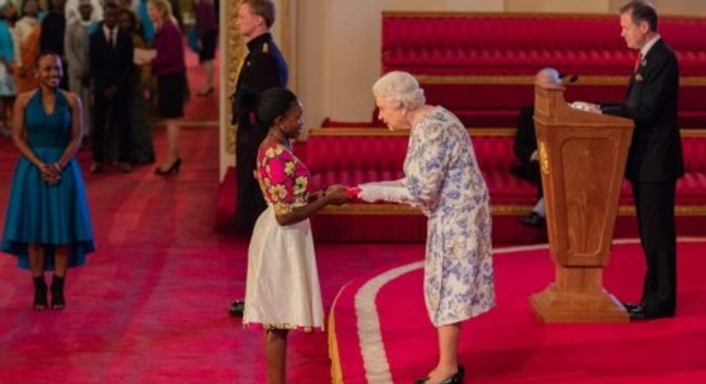 Queen Elizabeth giving an award