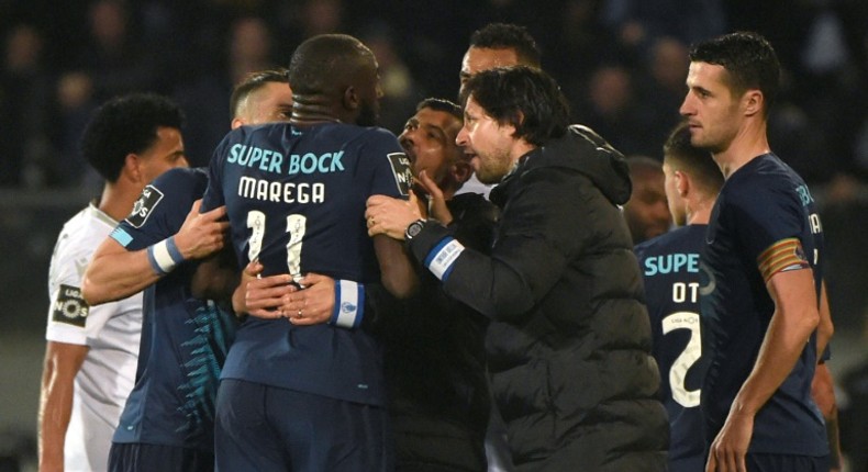 Players from both sides as well as Porto coach Sergio Conceicao attempted to stop Moussa Marega from leaving the pitch