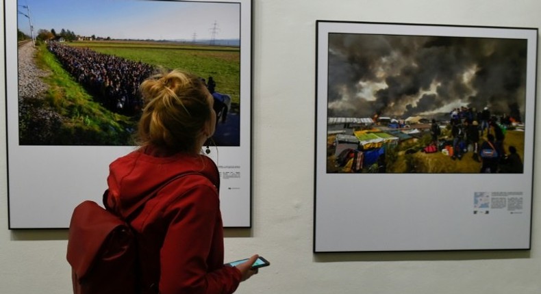 An exhibition showcasing the work of Agence France-Presse photographers who have documented the hope and heartbreak of Europe's migration crisis opened at the Bozar arts centre in Brussels, on May 3, 2017