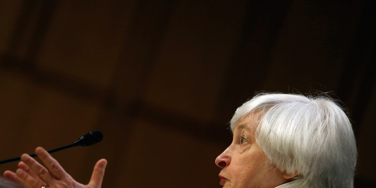 Fed holds rates and says it's waiting for 'some further evidence' before hiking again