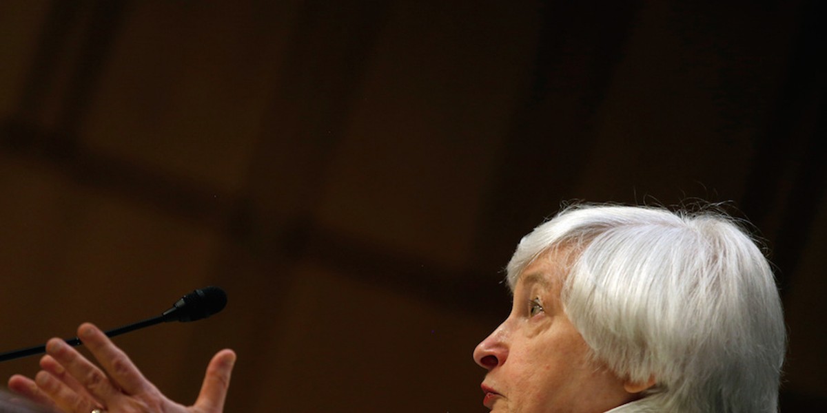 Fed holds rates and says it's waiting for 'some further evidence' before hiking again