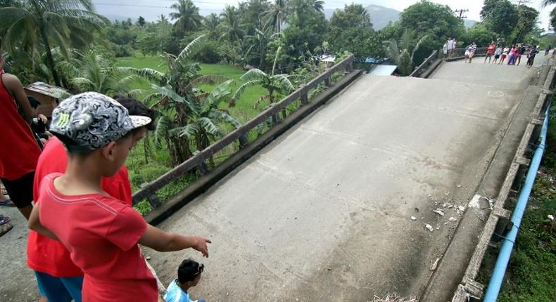 A bridge linking the city of Surigao to nearby towns, damaged after a 6.5-magnitude earthquake struck overnight on the southern Philippine island of Mindanao, on February 11, 2017