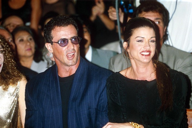 Dženis sa bivšim partnerom Silvesterm Staloneom 1994. na reviji u Parizu 