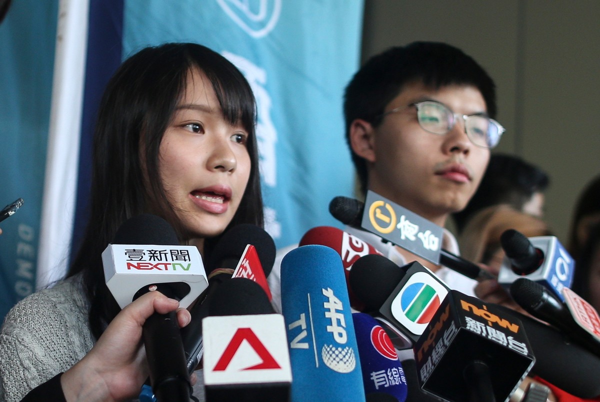 Działącze demokratyczni z Hongkongu Joshua Wong i Agnes Chow
