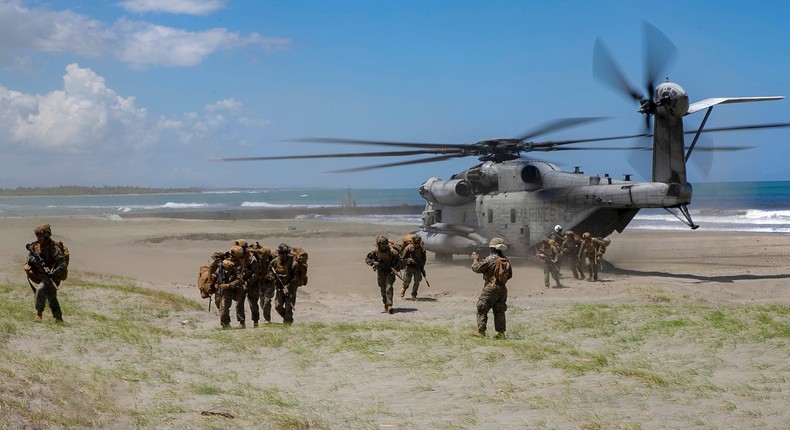 US Marines exit a CH-53E helicopter during Balikatan 22 in northern Luzon in March 2022.US Marine Corps/Sgt. Melanye Martinez